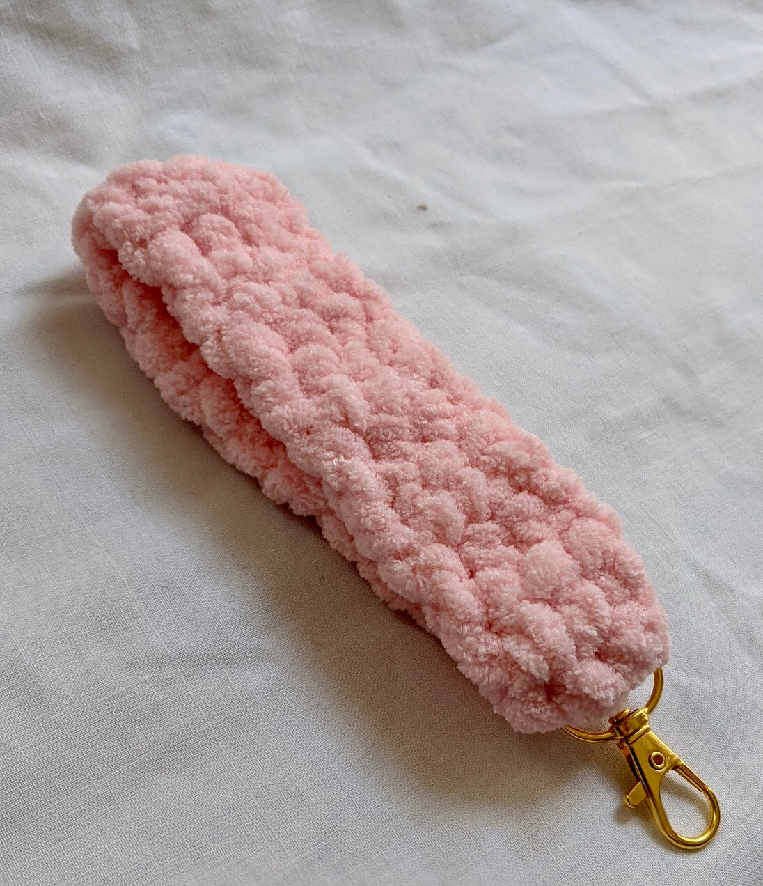Fuzzy wristlet